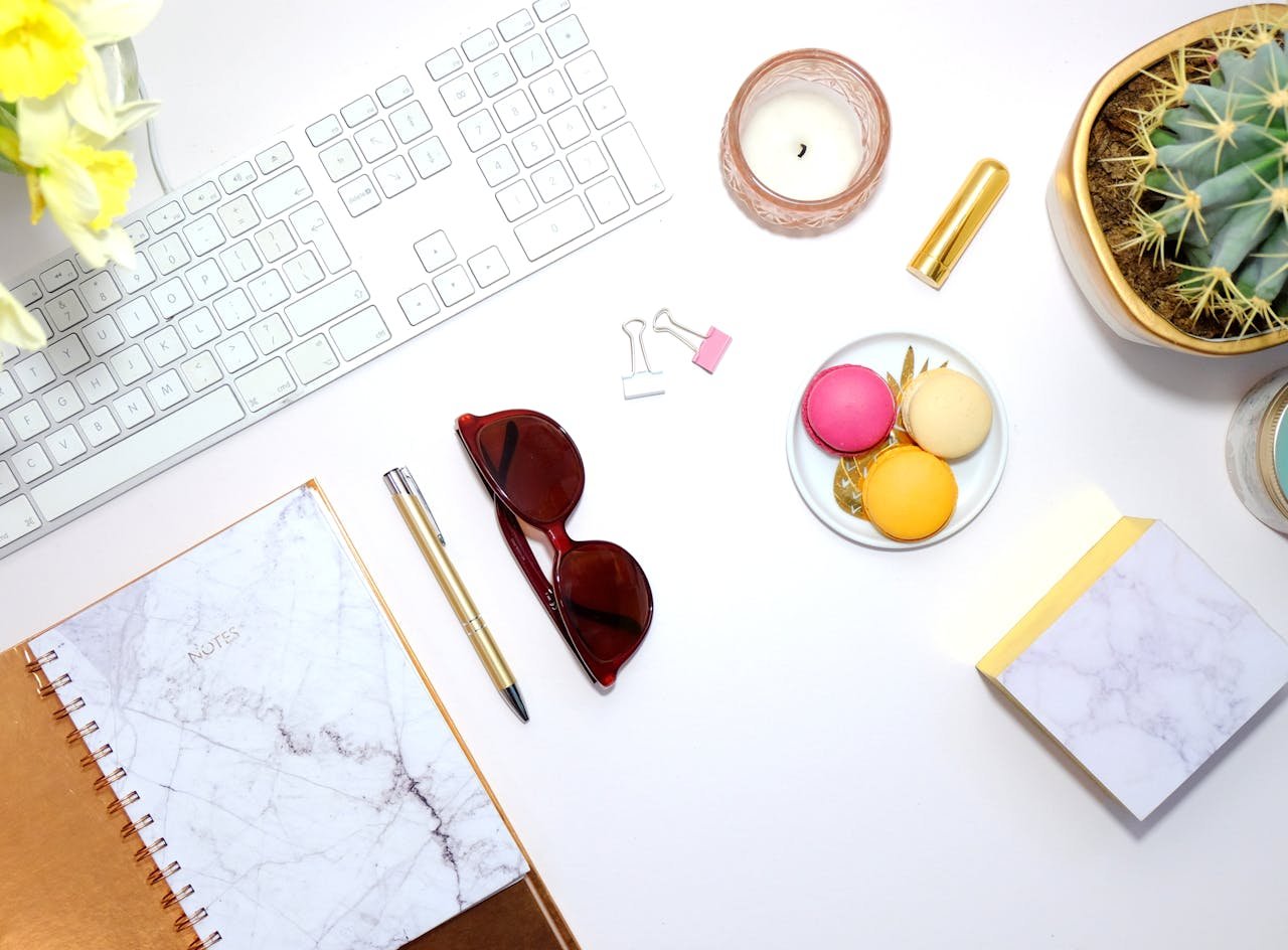 Luxury travel planning workspace with itinerary, passport, and notebook